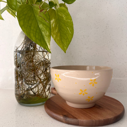 wonky bowl with yellow flowers