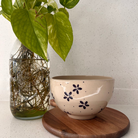 wonky bowl with purple flowers