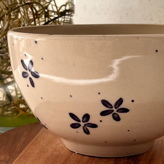 wonky bowl with purple flowers